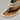 Men's OluKai Ulele Sandal in Clay / Mustang, worn on foot