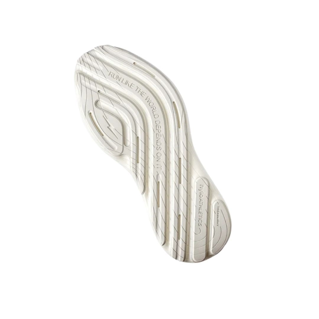 Hylo Axis running shoe in Sand/Oat, outsole view showing the TreadLight natural rubber tread