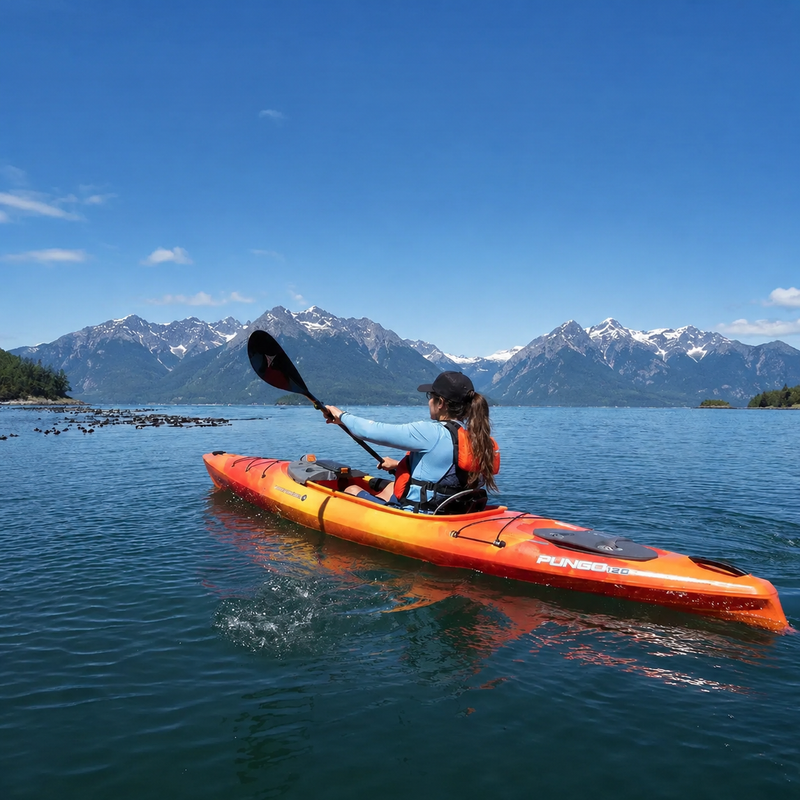 girl kayaking in the mountains