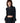 Woman in black Womens Boost Jacket, partially unzipped, over a black crop top, with a stand collar and thumbholes.